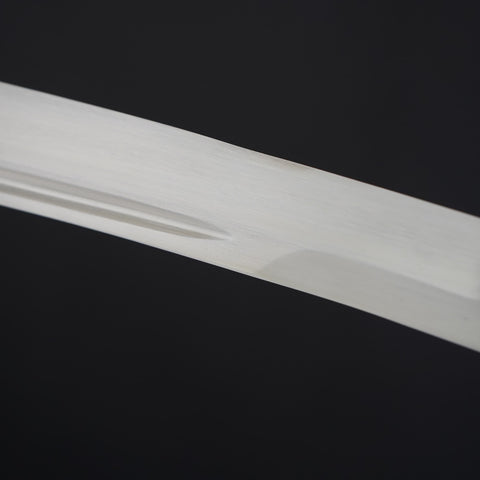 Close-up of a white rectangular object on a black background