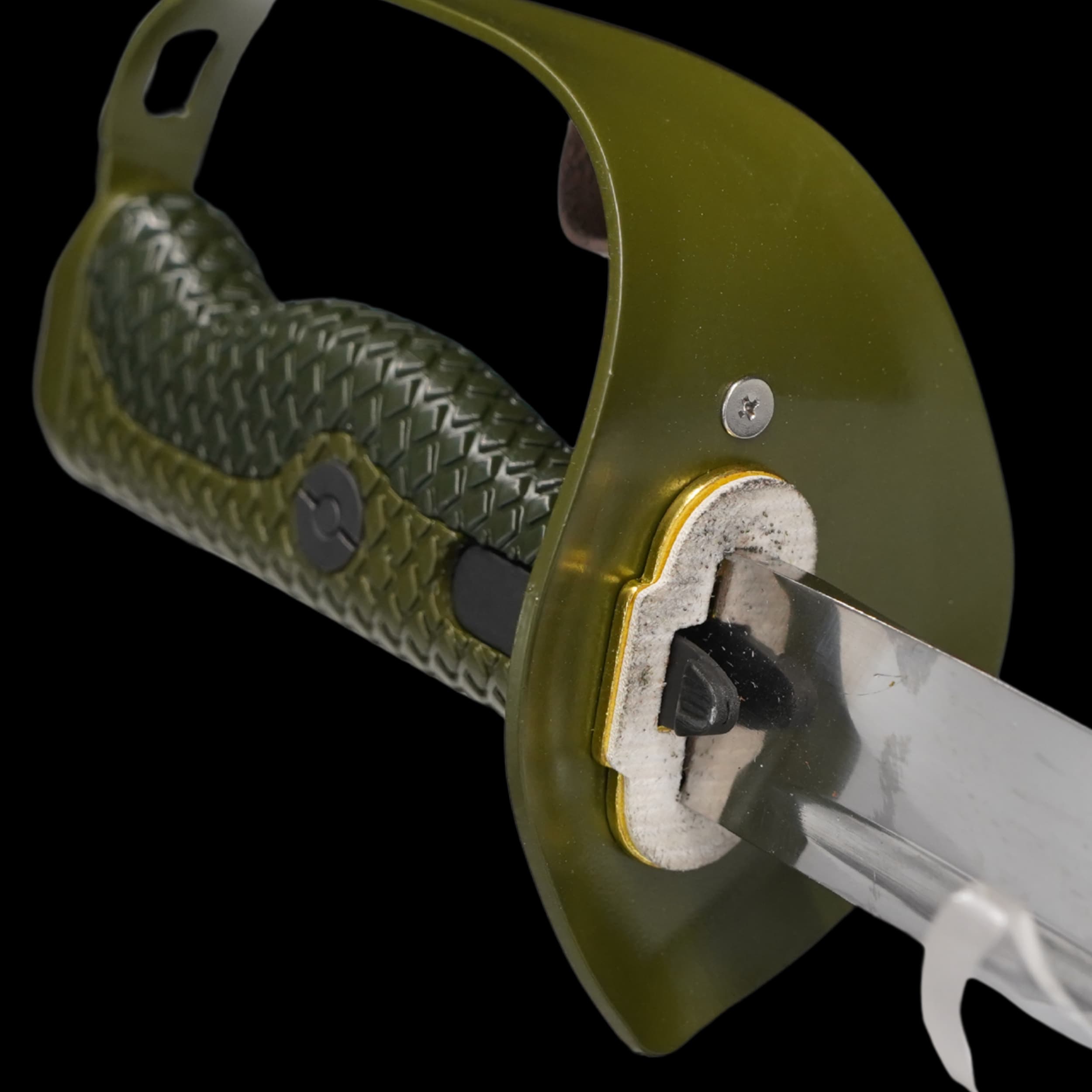 Green knife sheath with textured handle and metal blade on a black background