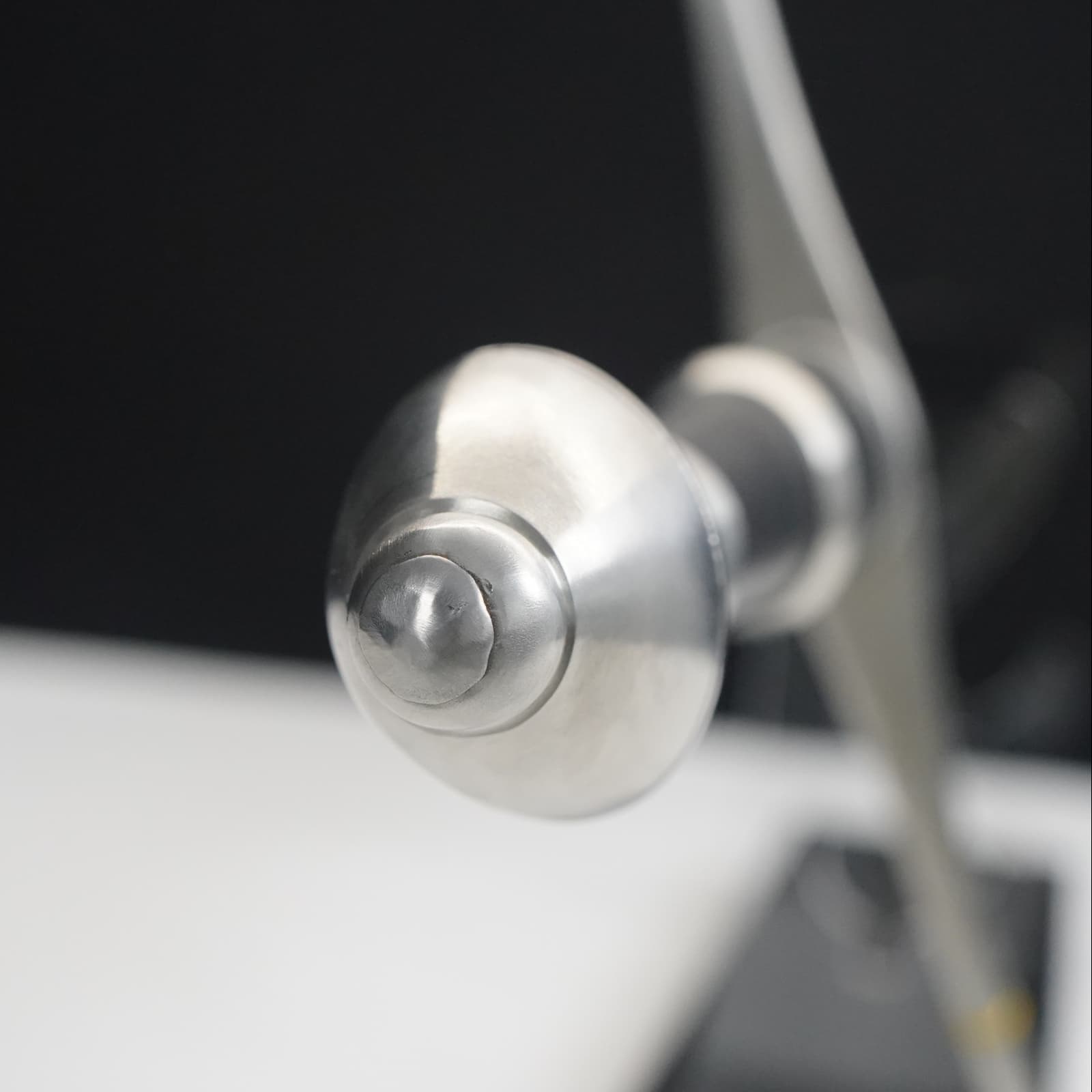 Close-up of a metallic doorknob on a door handle.