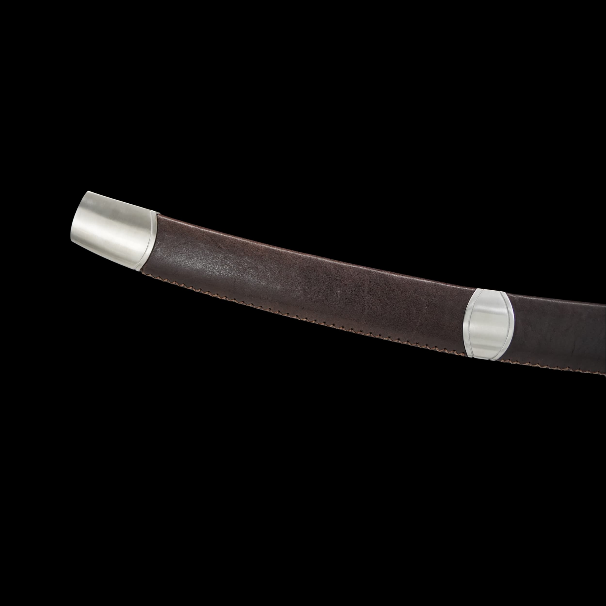 Brown belt with silver buckles on a black background