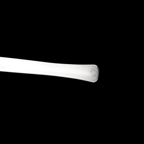 Metallic object on a black background