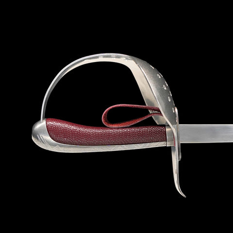Sword with a red hilt on a black background