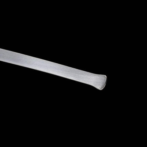 Metallic rod on a black background