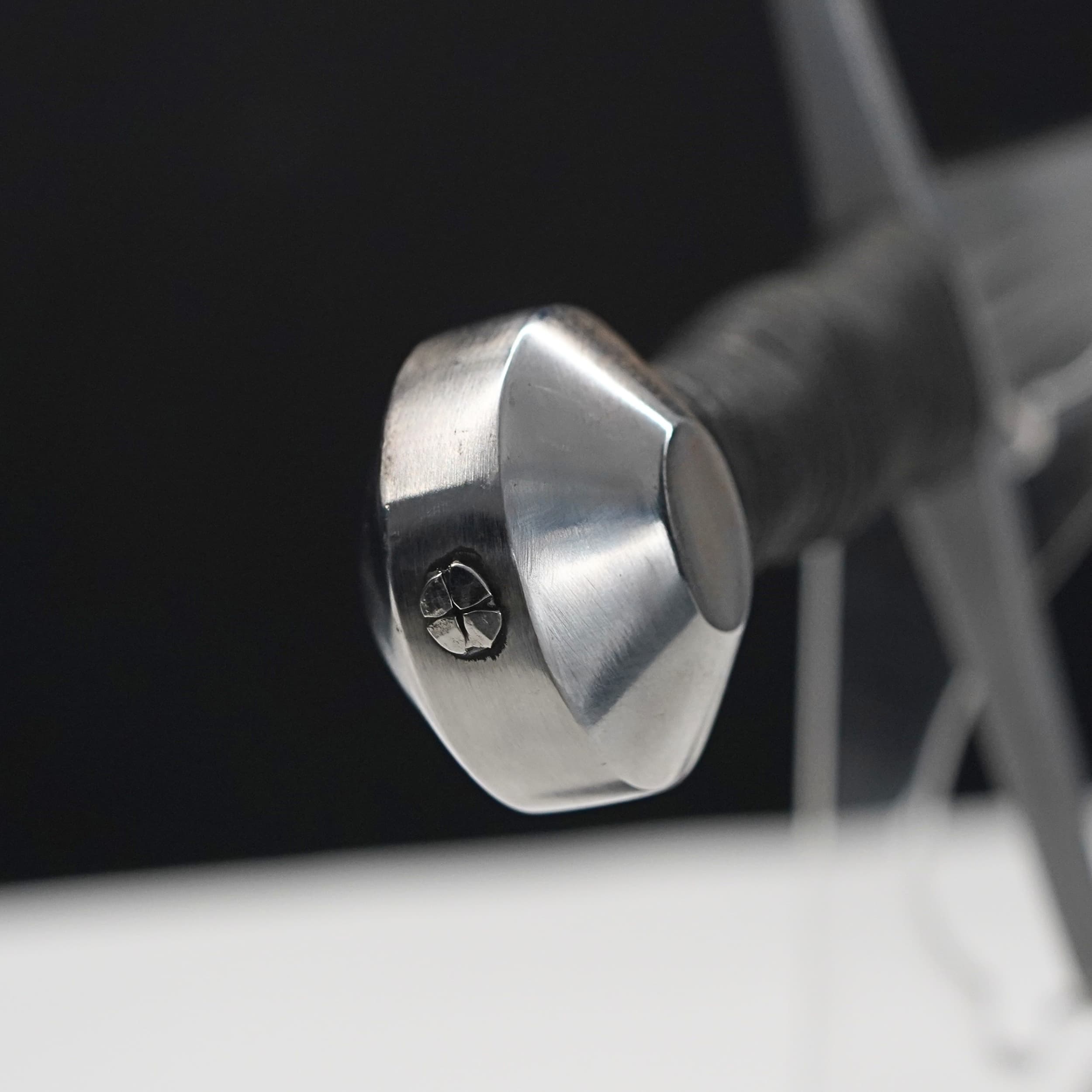 Close-up of a metallic object with a blurred background