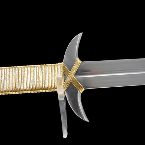 Sword with gold hilt on a black background