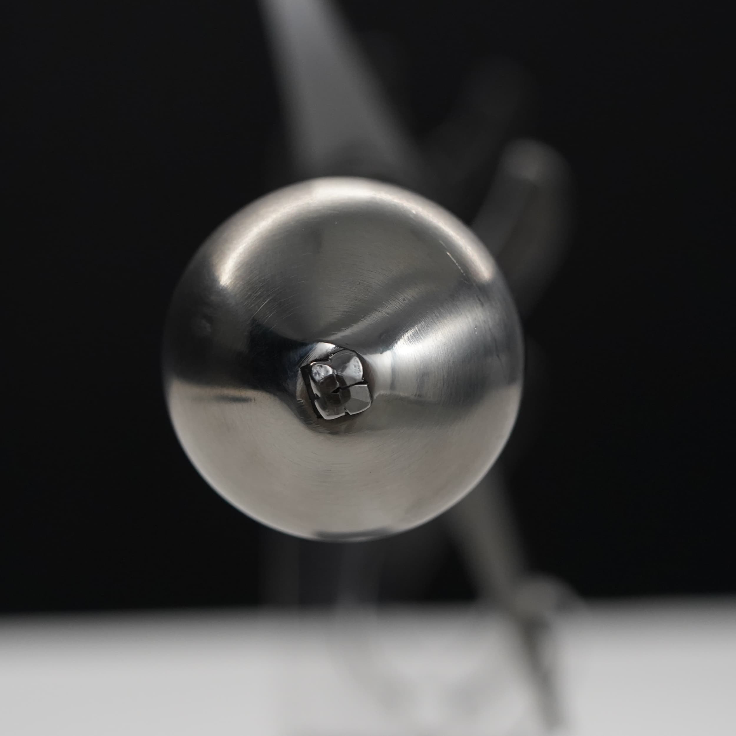 Close-up of a metallic object with a blurred background