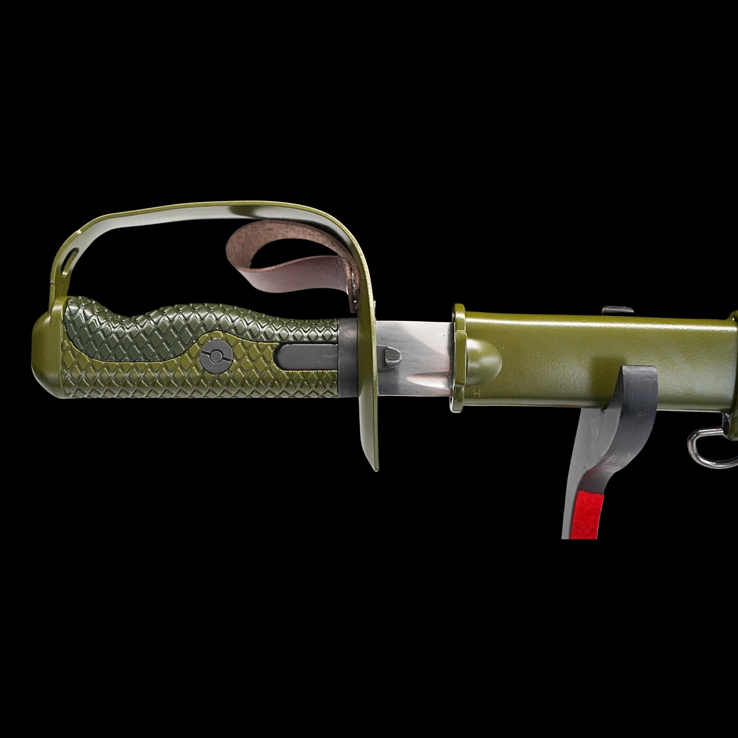 Green knife with a textured handle on a black background