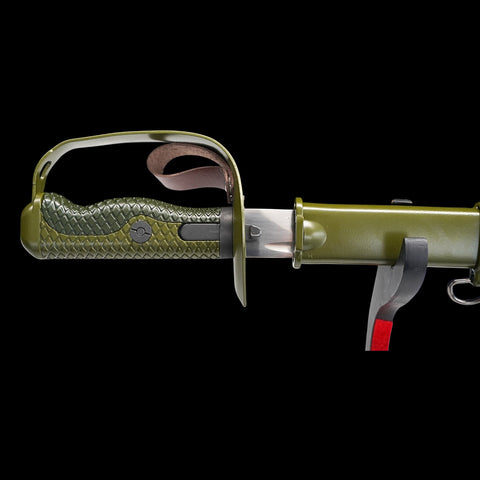Green knife with a textured handle on a black background