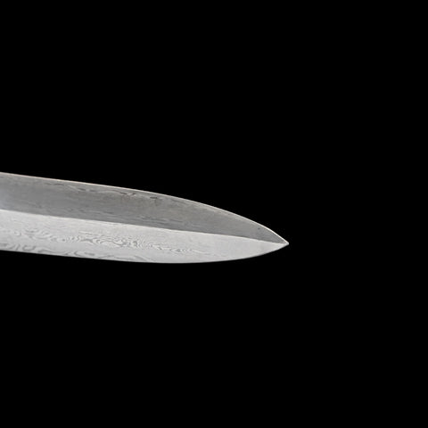 Close-up of a sword blade on a black background