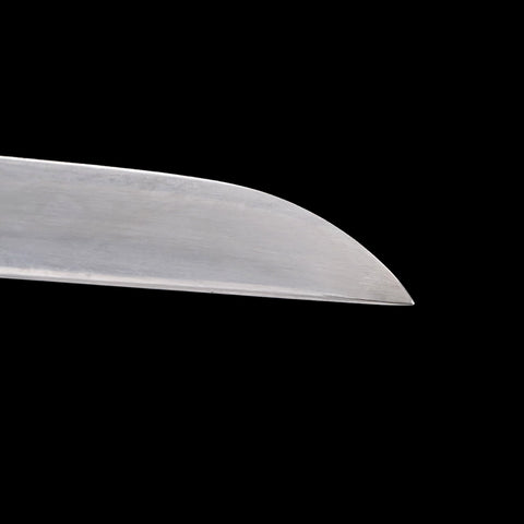 Close-up of a sword blade on a black background